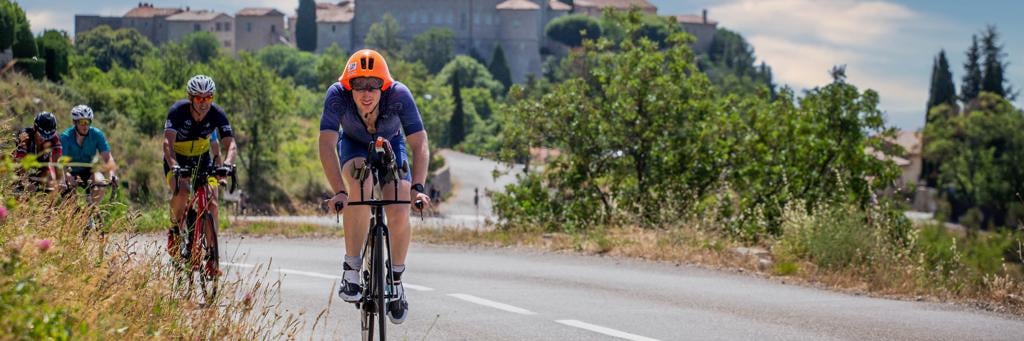 Athletes biking through the spectacular and challenging hinterland of Nice France surrounded by nature