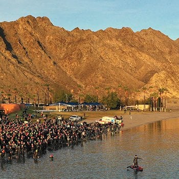 Triathletes ready to enter the water at IM703 Indian Wells