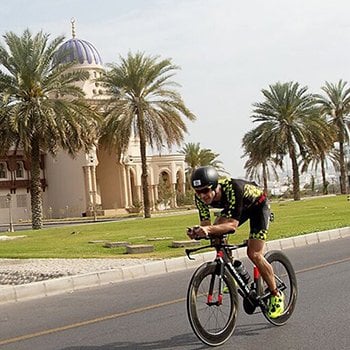 Triathlete biking 5150 Muscat Oman