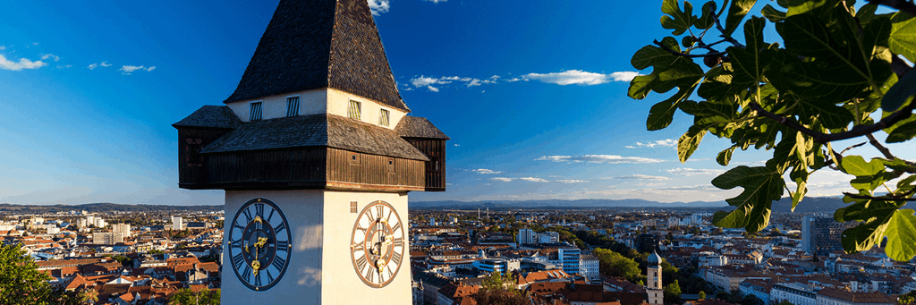 Close-up of Graz Clock Tower at the famous Schlossberg with views of the Old Town 