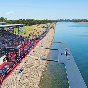 Race start near water at IM703 Western Sydney