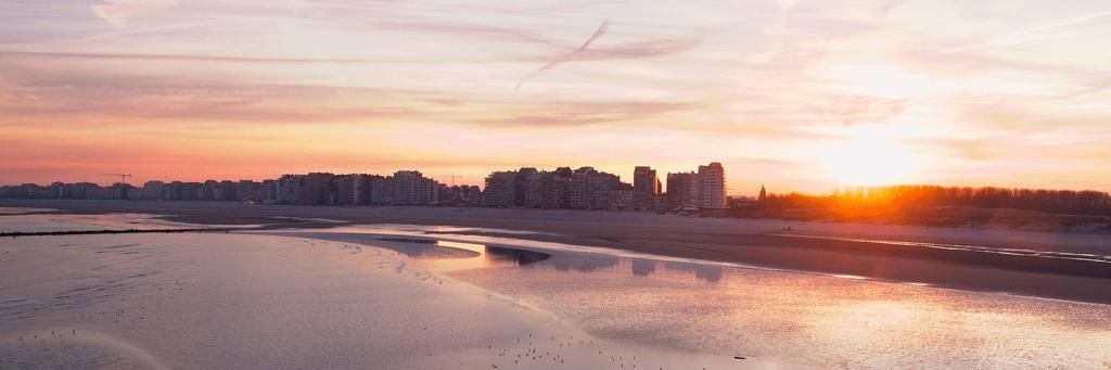 Sunset at the beach with skyline at Knokke-Heist, Belgium