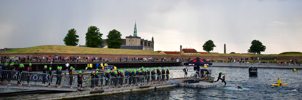 IRONMAN 70.3 Elsinore athletes at the swim start with the Kronborg castle in the background