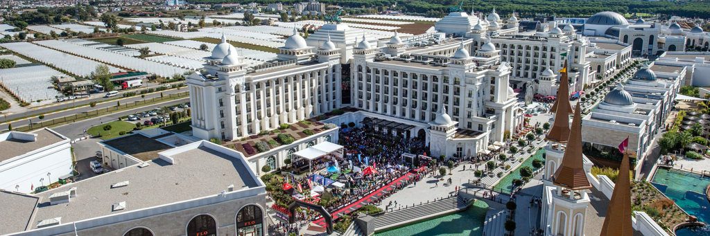 The impressive finish line of IRONMAN 70.3 Turkey in the famous theme park "Land of Legends" with massive spectators in Belek