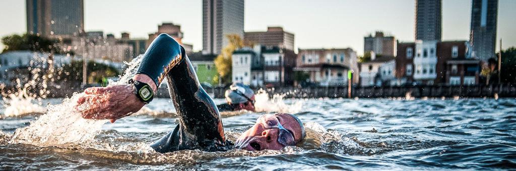 Swimmers participating in a IRONMAN 70.3 race