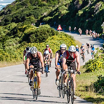Athletes biking in a row at IRONMAN African Championship